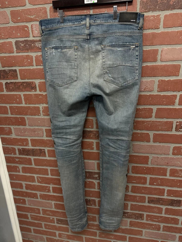 Amiri MX1 Patch Jeans Bone Cross